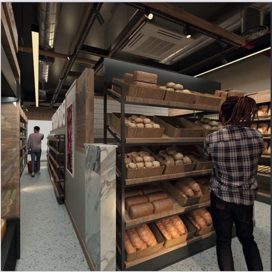 Design visual of a bread display on black steel racks with a customer browsing, and a long aisle beyond