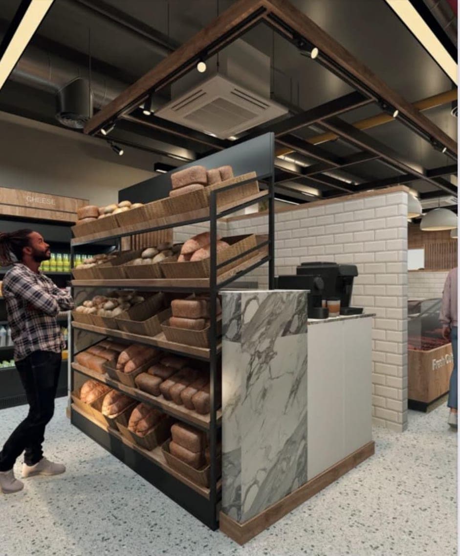 Design visual of bread racks with a marble-effect end panel, a timber-framed ceiling feature and a customer choosing a loaf