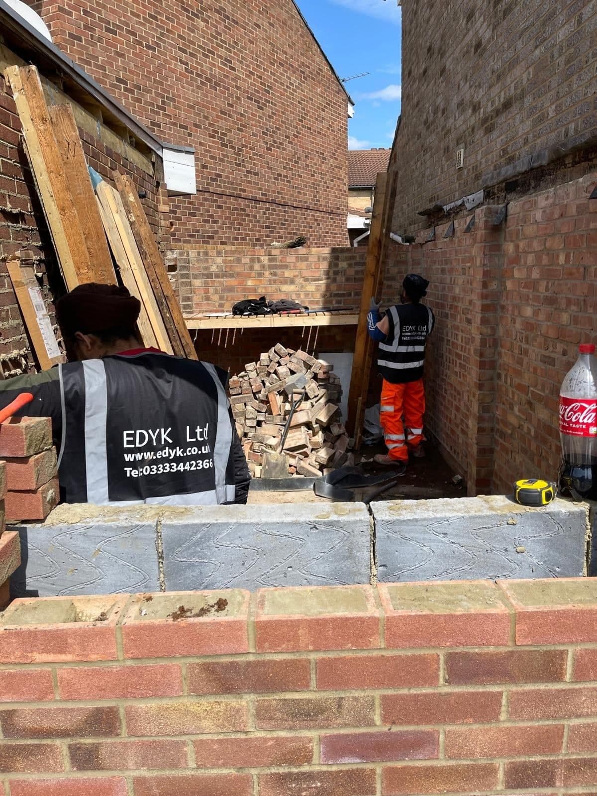 EDYK team members building blockwork and brickwork walls for a house extension
